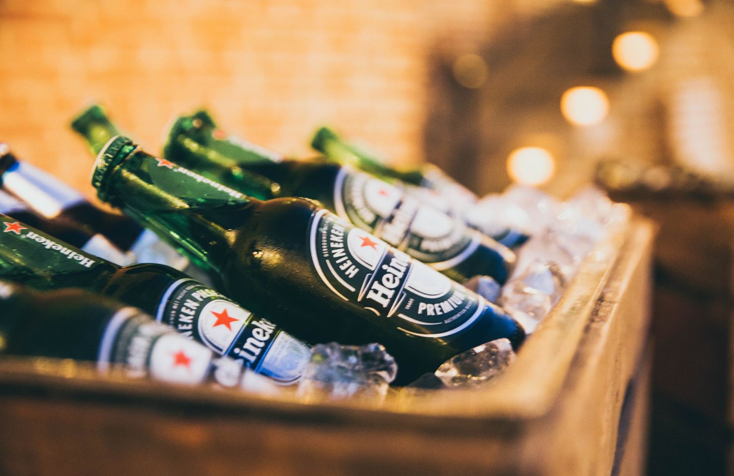 Heineken Beers stacked up in a Box with Ice