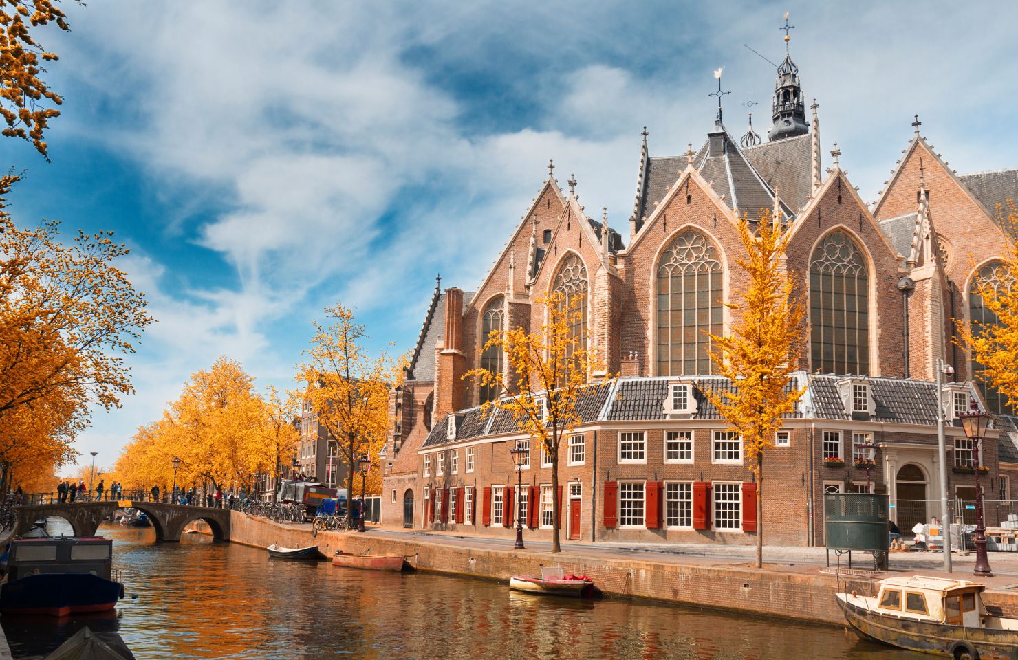 View over the canal towards a church in Amsterdam