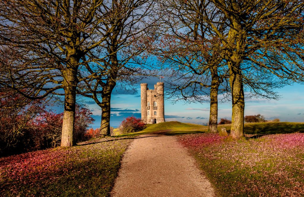 autumn in the uk with a photo of a castle amongst coloured leaves