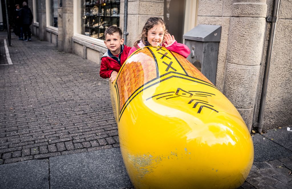 kids in a big clog in amsterdam