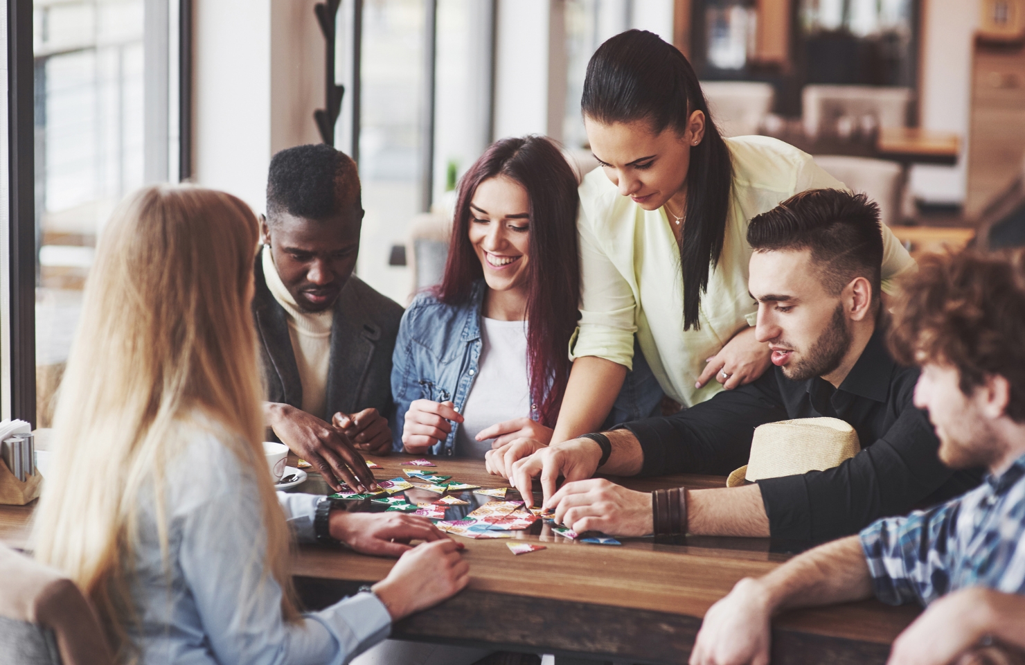 brother and sisters give a board game as a sibling gift