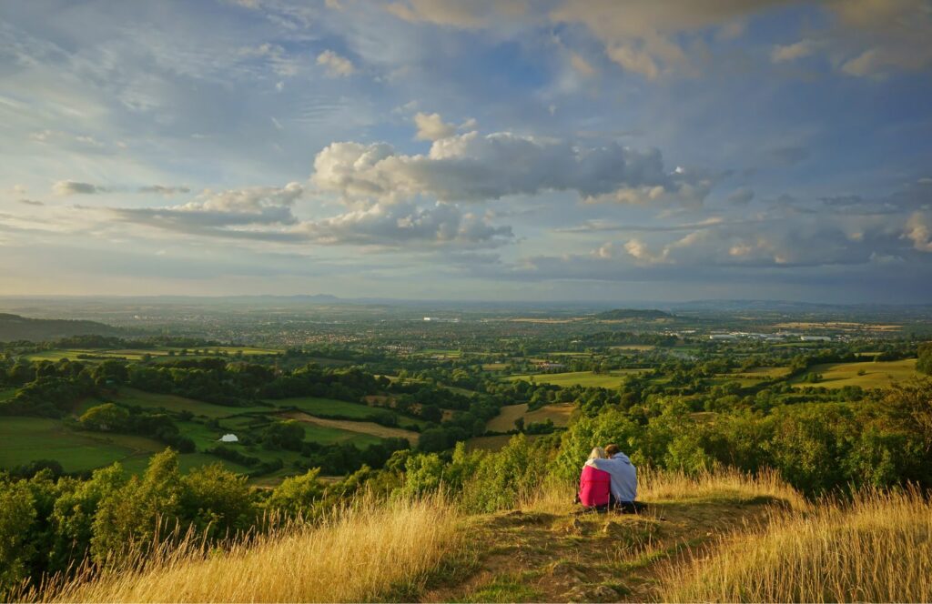 a couple walk in the cotswolds