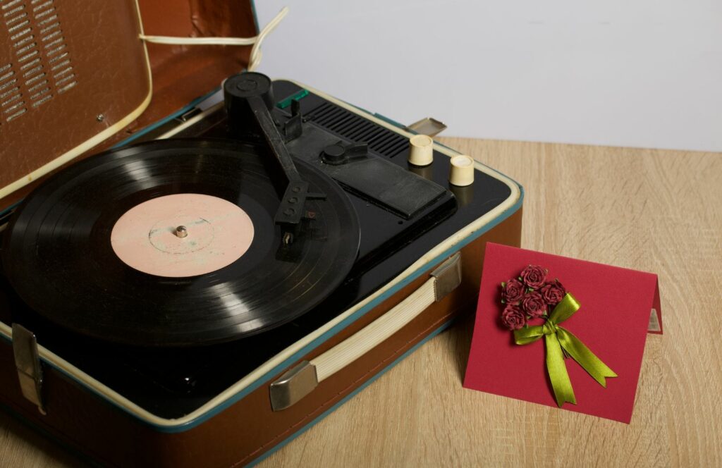 a vinyl record player is given as a retro gift 