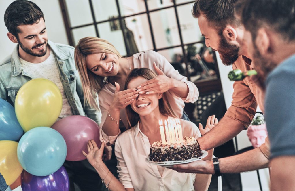 a birthday party for her where she's given a personalised gift