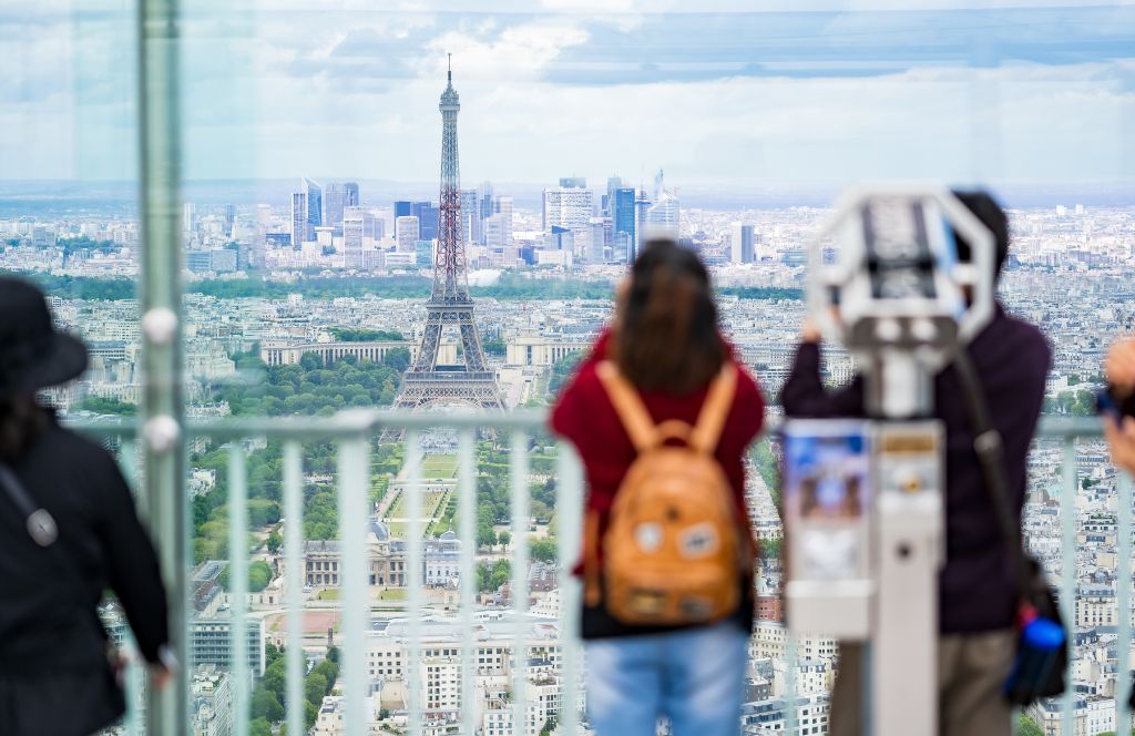 a lady redeems her activity voucher on a paris activity to Montparnasse Tower