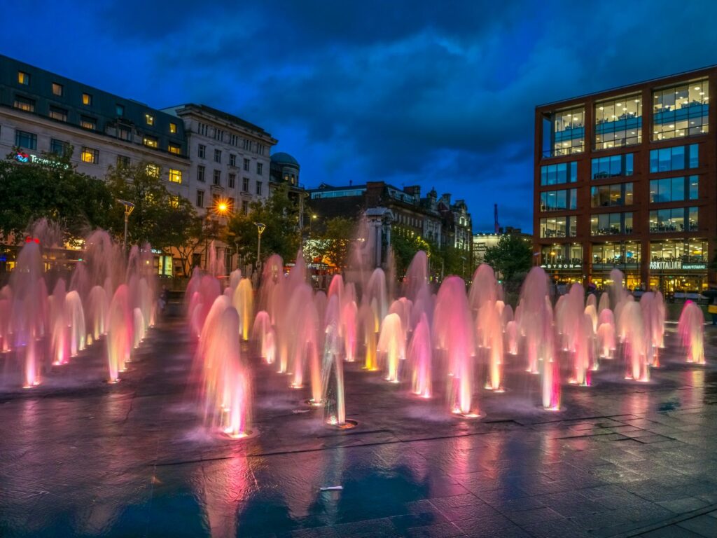 Piccadilly Gardens in Manchester at night