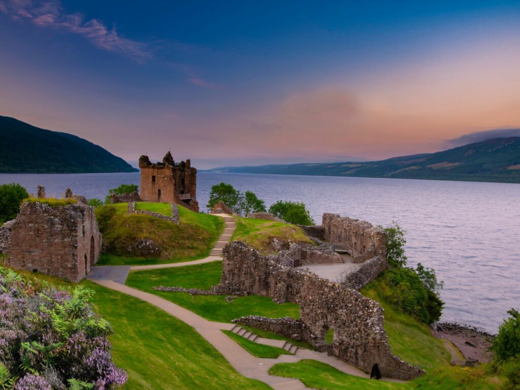 urquhart castle and loch ness at sunset
