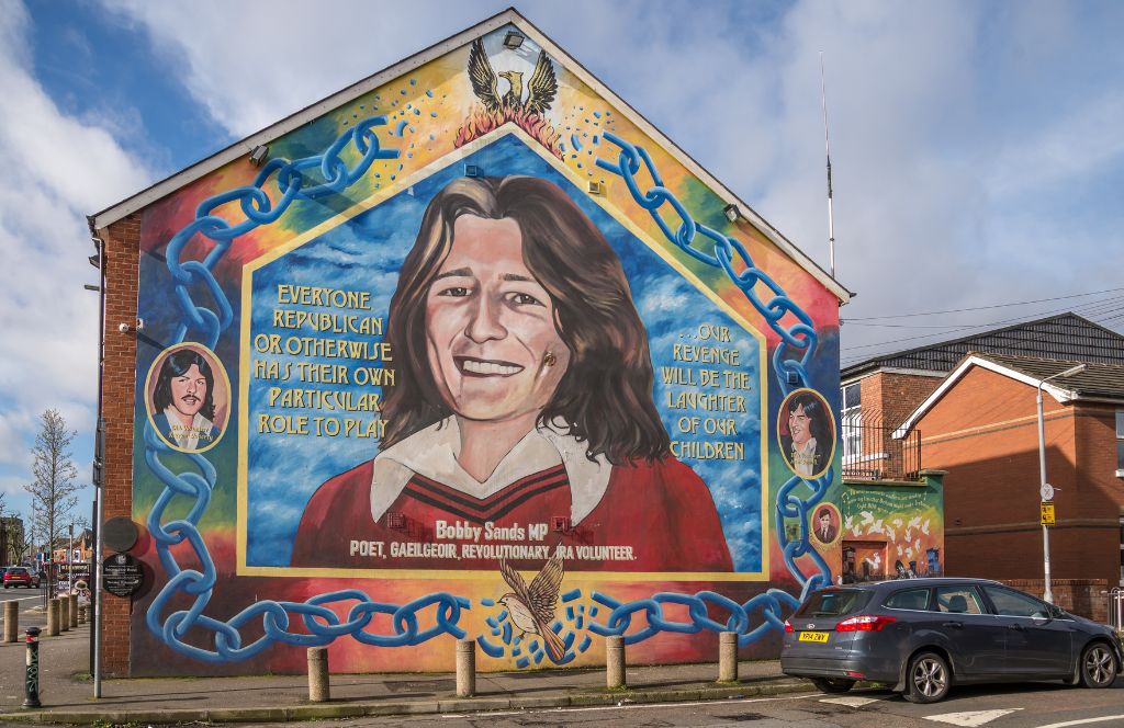a mural of bobby sands on a northern ireland experience gift walking tour