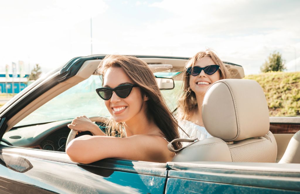 two women in a convertible