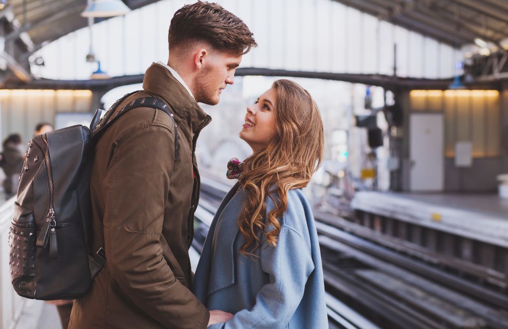 a couple part ways at the train station