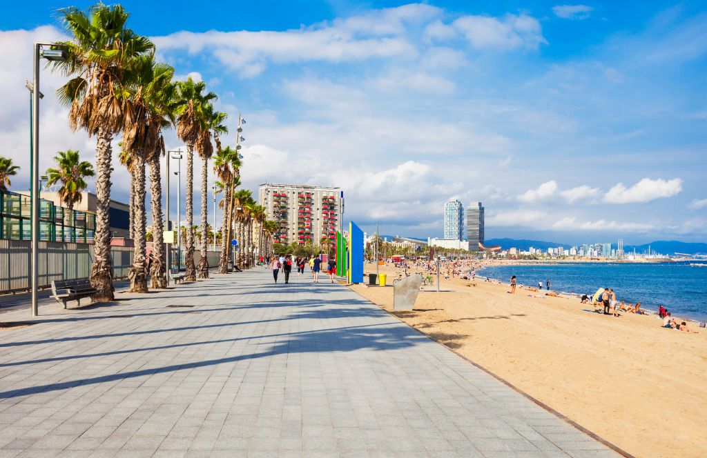 visit Barceloneta Beach as a things to do with friends in barcelona