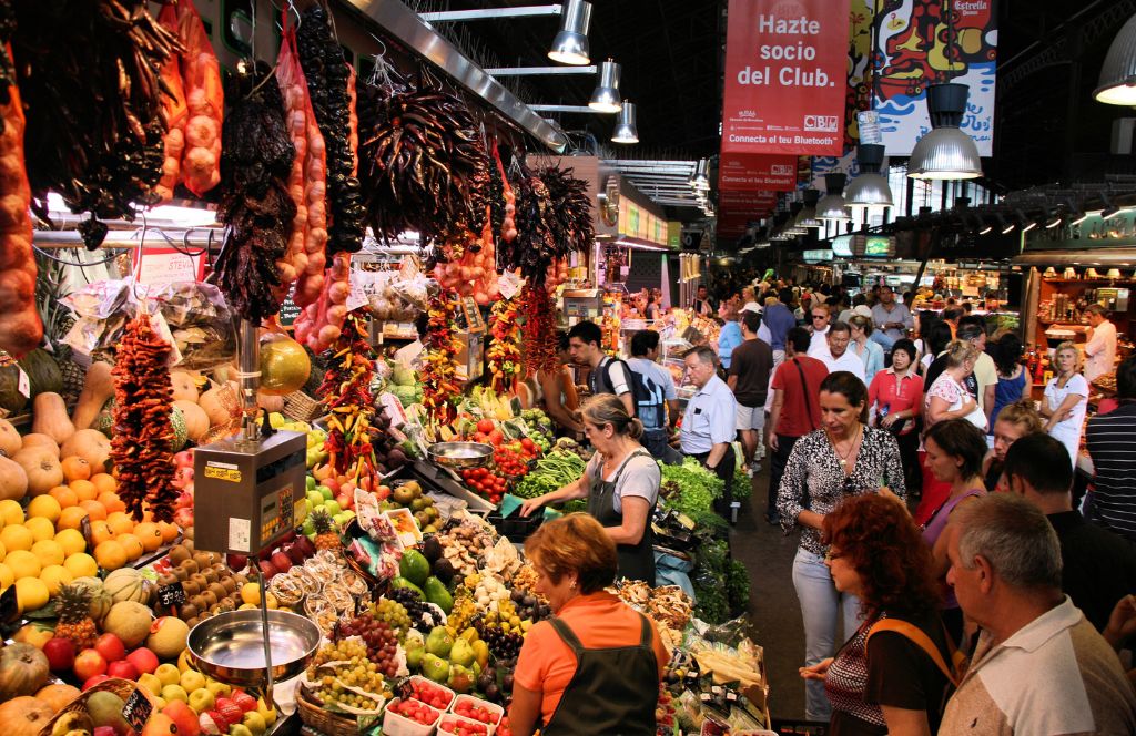 go to a food market in barcelona with your friends
